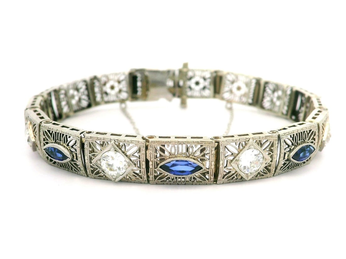 Antique Art Deco 10k White Gold Filigree Diamond Sapphire Bracelet: Antique Art Deco 10k White Gold Filigree Diamond Sapphire Bracelet This exquisite Antique Art Deco bracelet features a stunning combination of diamonds and sapphires, crafted from high-quality 10k whi