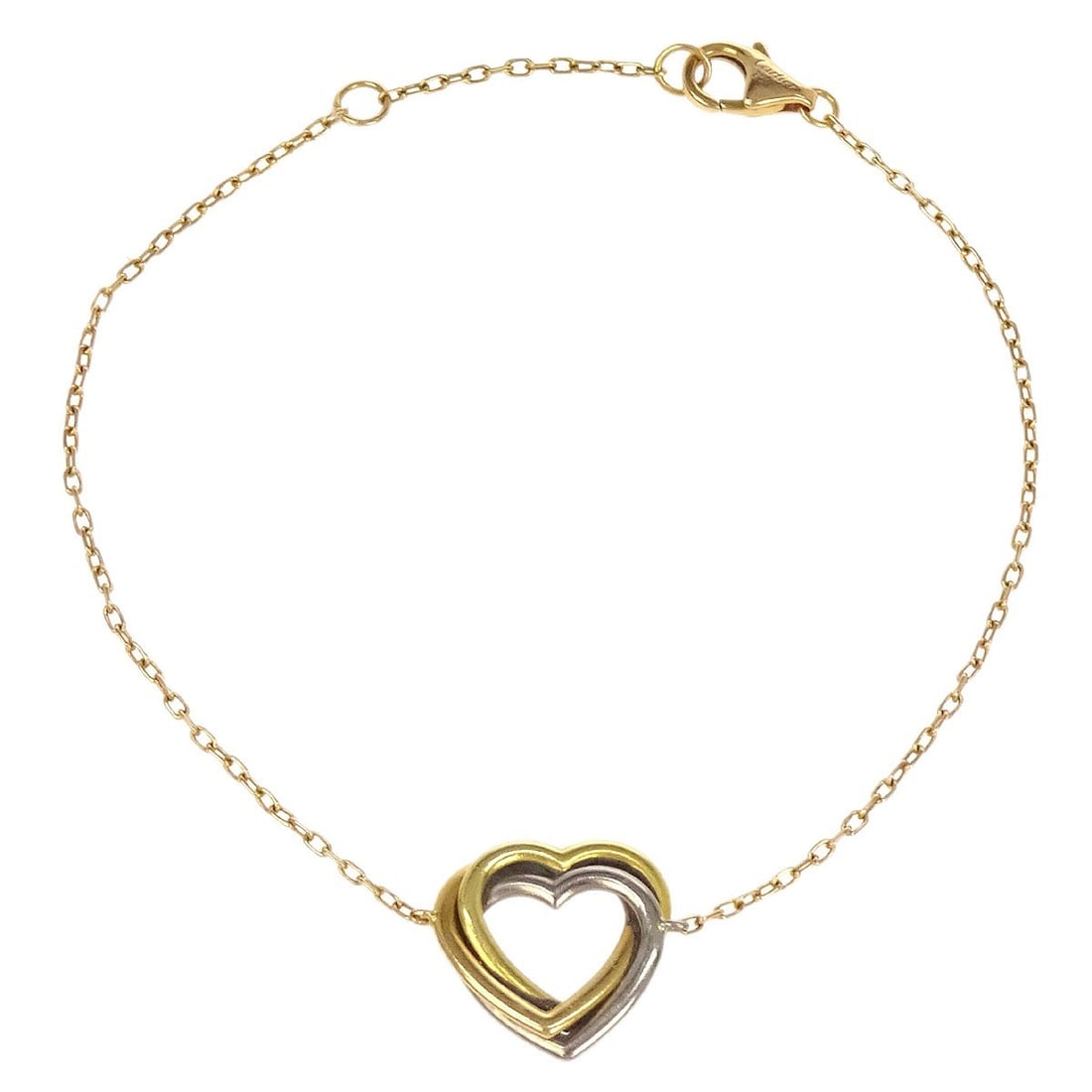 Cartier Trinity Heart Bracelet Au750 Gold Chain: Cartier Trinity Heart Bracelet Au750 Gold Chain This exquisite Cartier Trinity Heart Bracelet is a stunning piece crafted from high-quality Au750 gold. The bracelet features a chain style that is both
