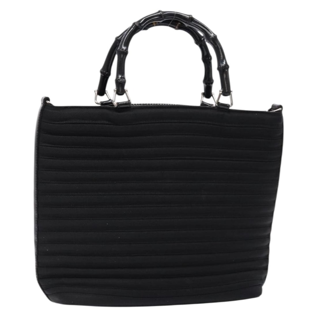 Gucci Black Vintage Nylon Bag with Bamboo Top Handle: Gucci Black Vintage Nylon Bag with Bamboo Top Handle This Gucci Vintage Bamboo Handle Bag is crafted from black nylon and features the iconic bamboo handle design. Designed for women, it originates fr