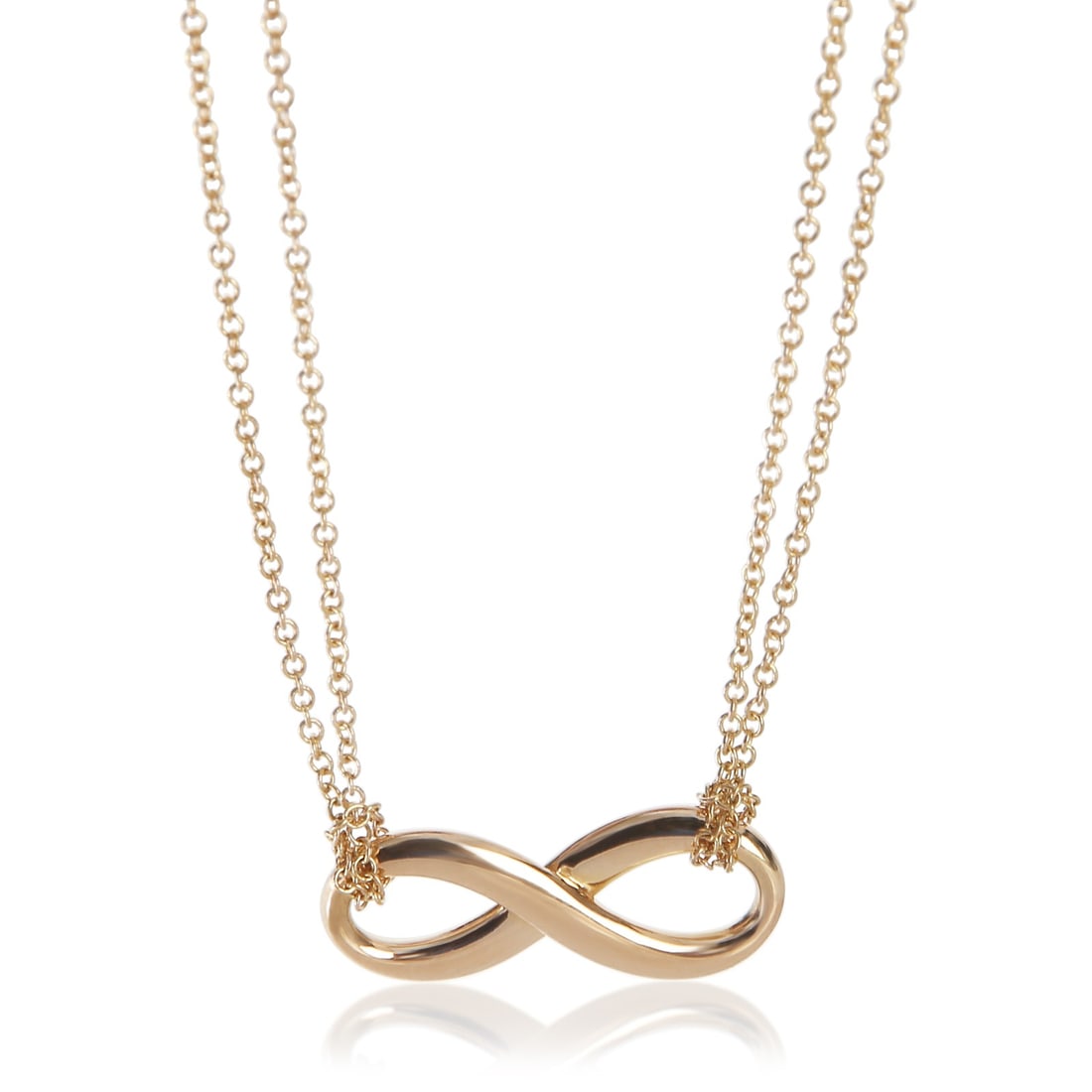 Tiffany & Co. Infinity 18k Rose Gold Necklace 16 in: Tiffany & Co. Infinity 18k Rose Gold Necklace 16 in This pre-owned Tiffany & Co. Infinity necklace is crafted from 18k rose gold, featuring a spring ring clasp and a classic pink hue. Part of the Infi