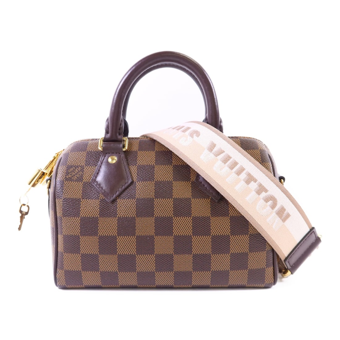 Louis Vuitton Speedy Bandouliere 20 Brown PVC Coated Canvas Bag GHW: Louis Vuitton Speedy Bandouliere 20 Brown PVC Coated Canvas Bag GHW This Louis Vuitton Speedy Bandouliere 20 is a versatile 2-way shoulder bag crafted from brown PVC coated canvas. Designed for women,