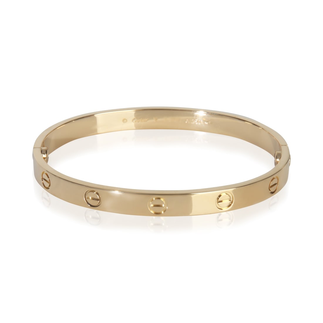 Cartier Love 18k Yellow Gold Screw Bracelet with Box Pouch: Cartier Love 18k Yellow Gold Screw Bracelet with Box Pouch This pre-owned Cartier Love Bracelet is crafted from 18k yellow gold and features the iconic screw motif. Measuring 18 cm in length, it is de