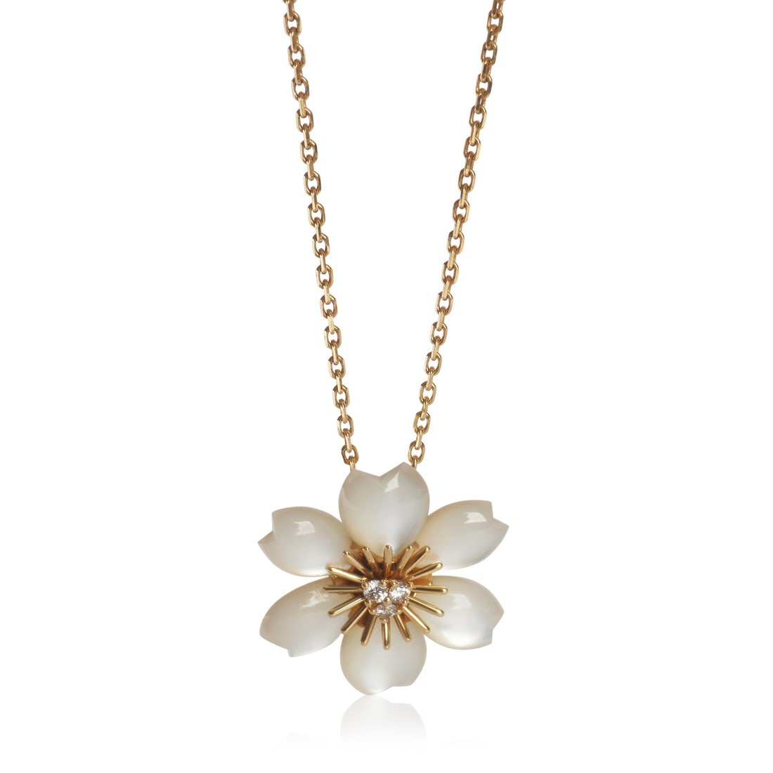 Van Cleef Arpels Mini Model Rose de Noel 18k Yellow Gold Pendant: Van Cleef Arpels Mini Model Rose de Noel 18k Yellow Gold Pendant This Van Cleef & Arpels Mini Model Rose de Noel pendant features a delicate combination of 18k yellow gold, white mother of pearl, and 