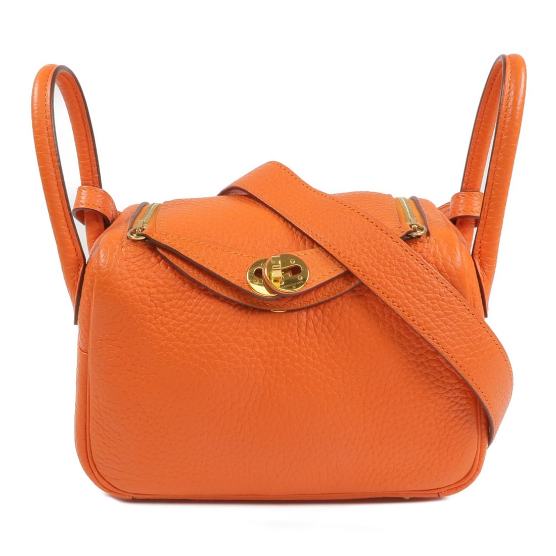 Hermes Mini Lindy Orange Togo Leather GHW Shoulder Bag: Hermes Mini Lindy Orange Togo Leather GHW Shoulder Bag This Hermes Mini Lindy 2-way shoulder bag is crafted from luxurious Togo calfskin leather in a vibrant orange color. Designed for versatility, it