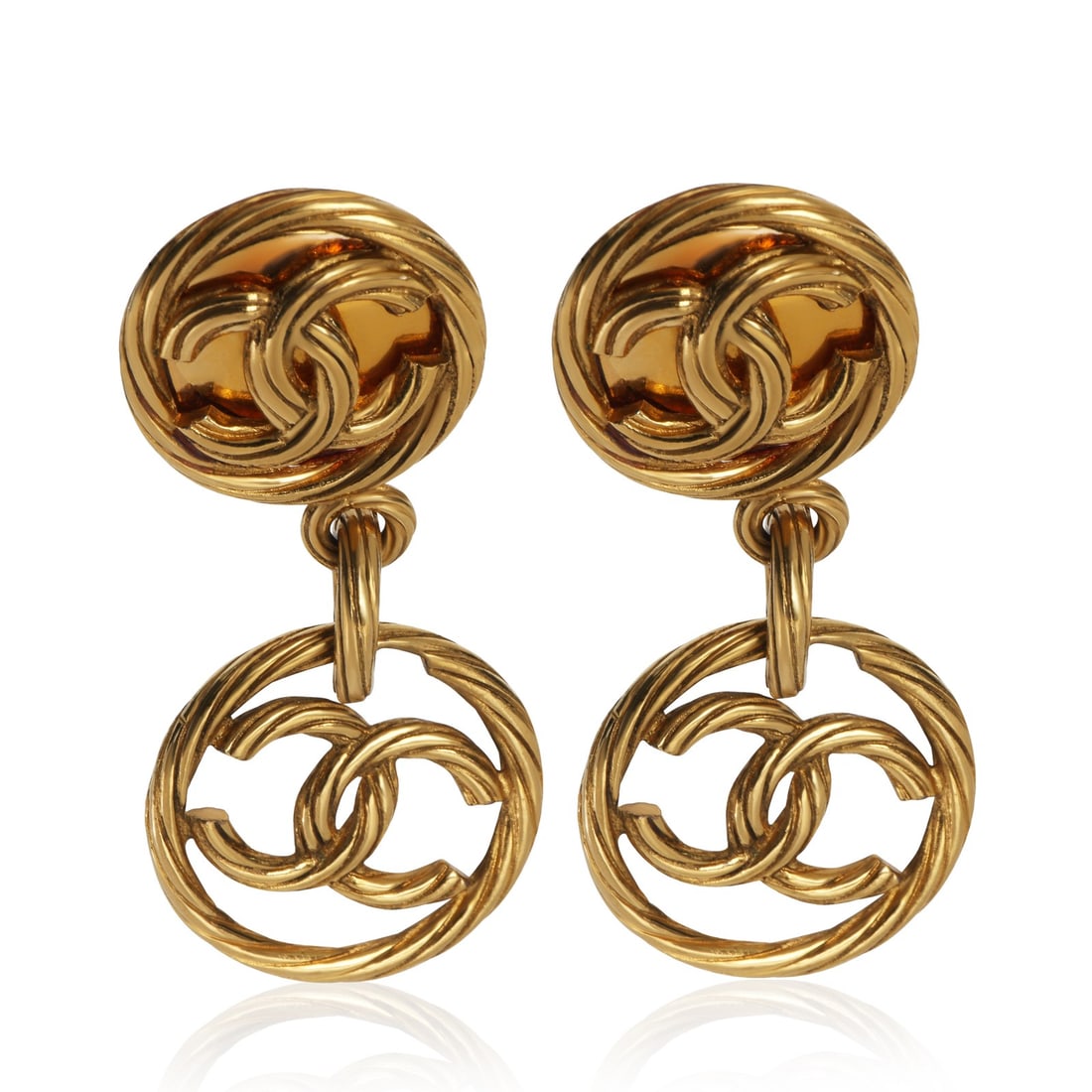 Chanel 1993 CC Drop Gold Plated Earrings: Chanel 1993 CC Drop Gold Plated Earrings These Chanel 1993 CC Drop Earrings feature a striking gold-plated design, showcasing the iconic CC logo. Crafted in France, these unisex earrings have a drop l