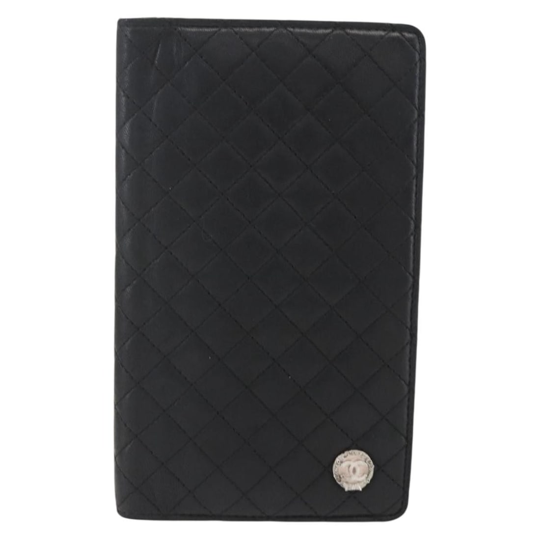 Black Leather Chanel Vintage CC Bifold Wallet for Women: Black Leather Chanel Vintage CC Bifold Wallet for Women This Chanel Vintage CC bifold wallet is crafted from black leather and designed for women. It features metal fittings and an organized bifold la