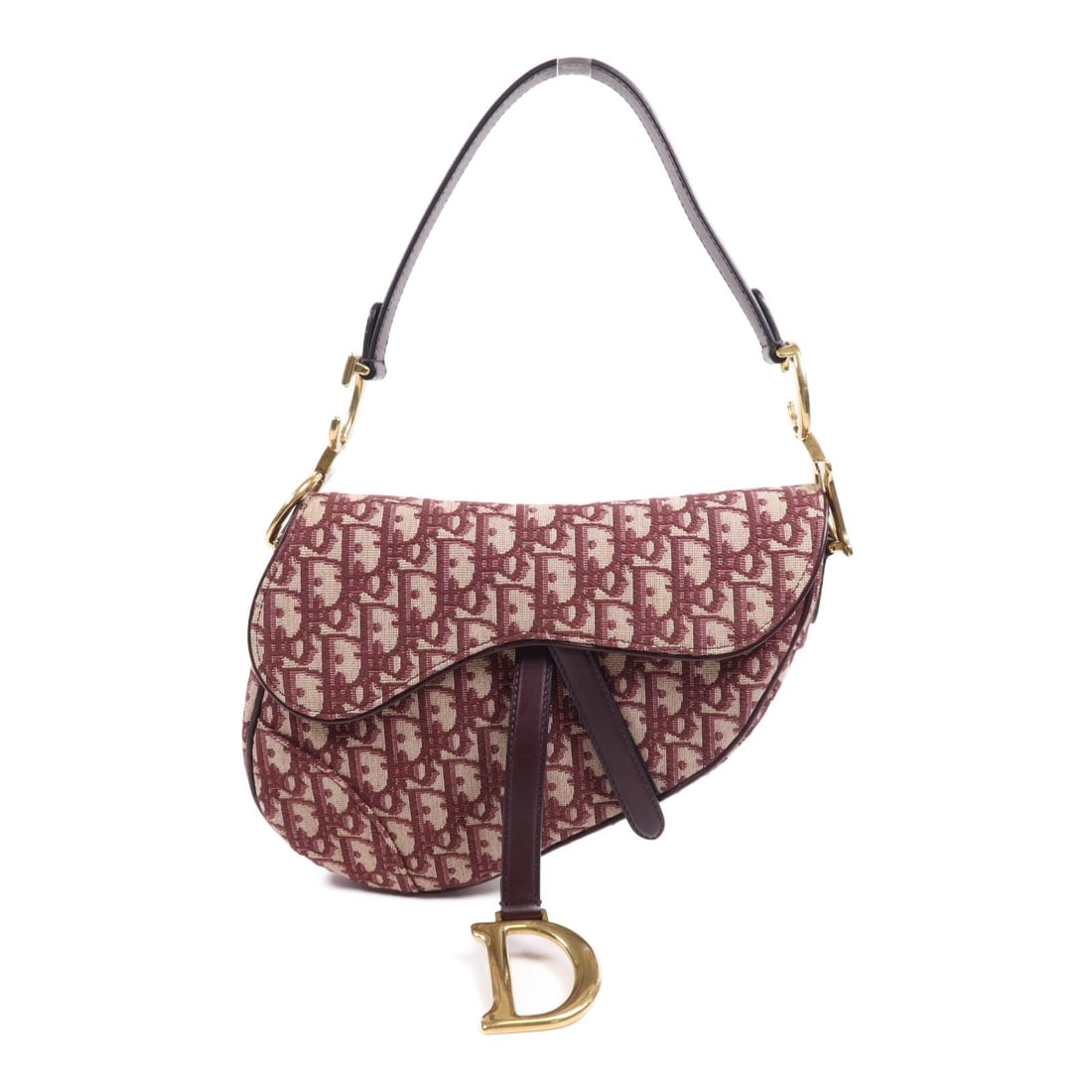 Dior Mini Saddle Red Canvas Shoulder Bag GHW France: Dior Mini Saddle Red Canvas Shoulder Bag GHW France This Christian Dior mini saddle bag features a red canvas exterior with gold-tone hardware. Designed as a shoulder bag, it offers a compact and styl
