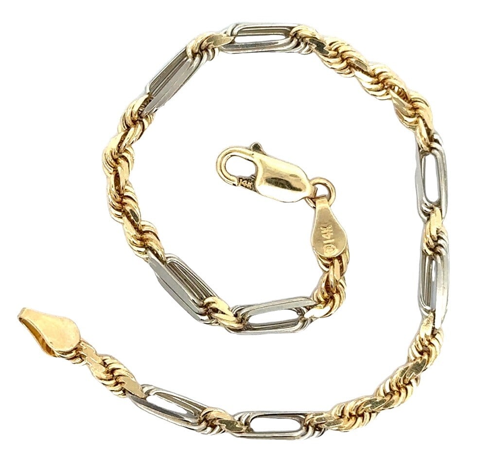 Unisex 14k Yellow White Gold 7 Inch Polished Rope Figaro Link Bracelet: Unisex 14k Yellow White Gold 7 Inch Polished Rope Figaro Link Bracelet This exquisite unisex bracelet features a polished 14k yellow and white gold design, showcasing a 3.4mm rope Figaro link chain. C