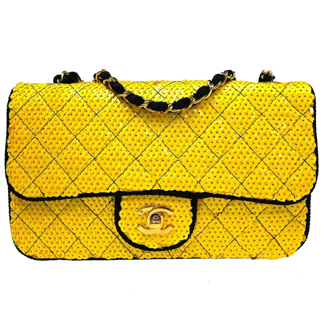 CHANEL Yellow Sequin Chain Strap Shoulder Bag: CHANEL Yellow Sequin Chain Strap Shoulder Bag This Chanel shoulder bag features a striking yellow sequin exterior accented with a black chain strap and turn lock closure. The medium-sized bag is desig