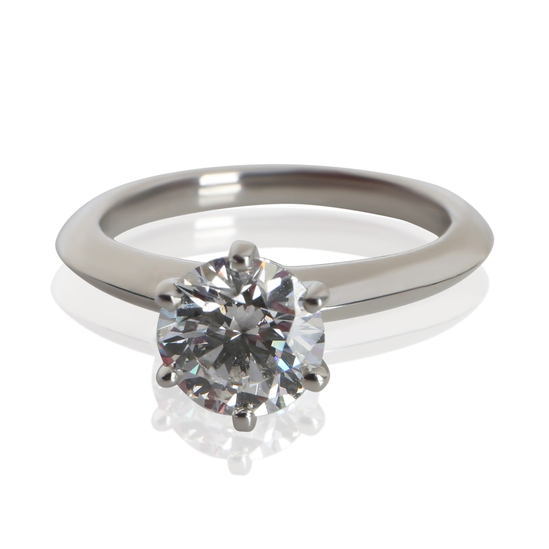 Tiffany & Co. Platinum 1.28 ct Round Diamond Engagement Ring Size 5: Tiffany & Co. Platinum 1.28 ct Round Diamond Engagement Ring Size 5 This Tiffany & Co. engagement ring features a 1.28 carat round brilliant diamond set in platinum. The diamond has an impressive D co