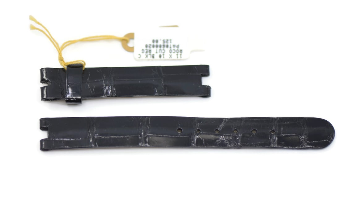 Patek Philippe Black Leather Watch Strap 11mm Authentic: Patek Philippe Black Leather Watch Strap 11mm Authentic This Patek Philippe wristwatch band features a sleek black leather design, perfect for adding a touch of elegance to your timepiece. The band me