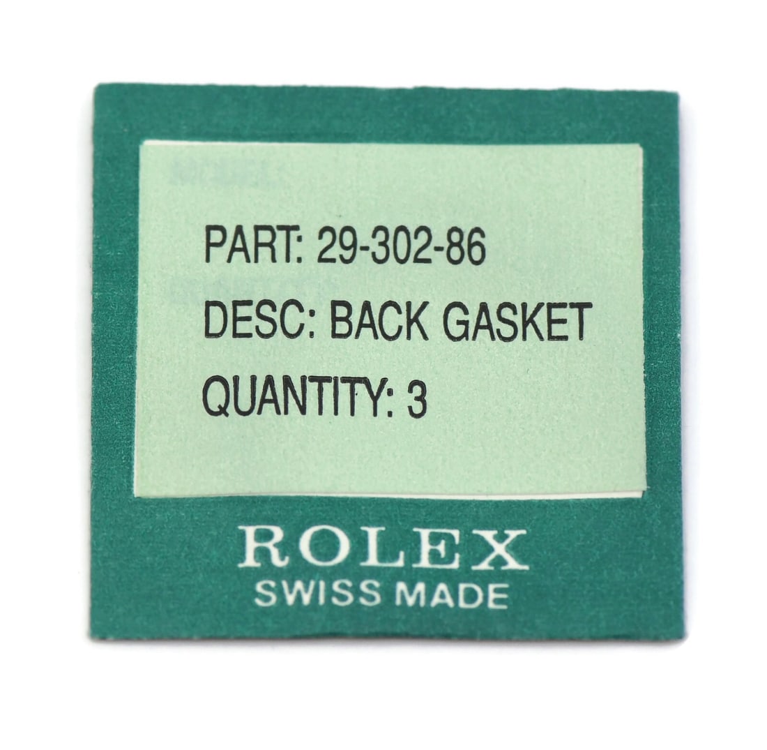 Rolex Back Gasket Replacement for Model 29-302-86: Rolex Back Gasket Replacement for Model 29-302-86 This is a pre-owned back gasket compatible with Rolex model 29-302-86. It is designed to ensure a secure seal for your Rolex watch, maintaining its fu