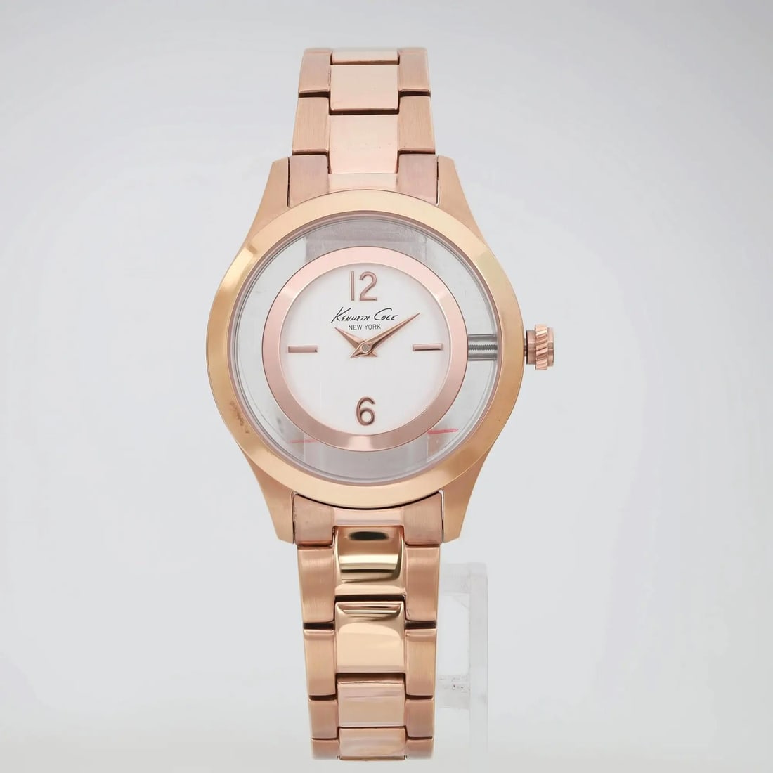 Kenneth Cole Ladies Quartz Watch Rose Gold Tone Stainless Steel KC9335: Kenneth Cole Ladies Quartz Watch Rose Gold Tone Stainless Steel KC9335 This Kenneth Cole ladies' wristwatch features a stunning rose gold-tone stainless steel case and bracelet, complemented by a tran