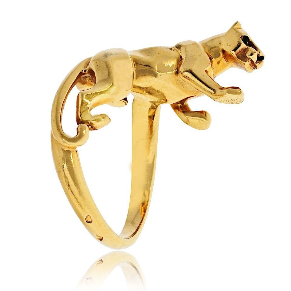 Vintage 18K Yellow Gold Panthere Estate Ring by Cartier Size 7.5: Vintage 18K Yellow Gold Panthere Estate Ring by Cartier Size 7.5 This iconic vintage Cartier Panthere ring is crafted in 18K yellow gold and features a sculpted panther that wraps elegantly around the