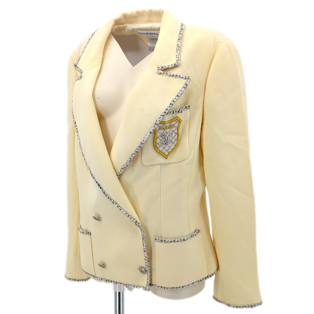 Chanel Double Breasted Jacket Off-White 100% Wool Size 44: Chanel Double Breasted Jacket Off-White 100% Wool Size 44 Elevate your wardrobe with this elegant Chanel Emblem Double Breasted Jacket in a sophisticated off-white hue. Made from 100% high-quality woo