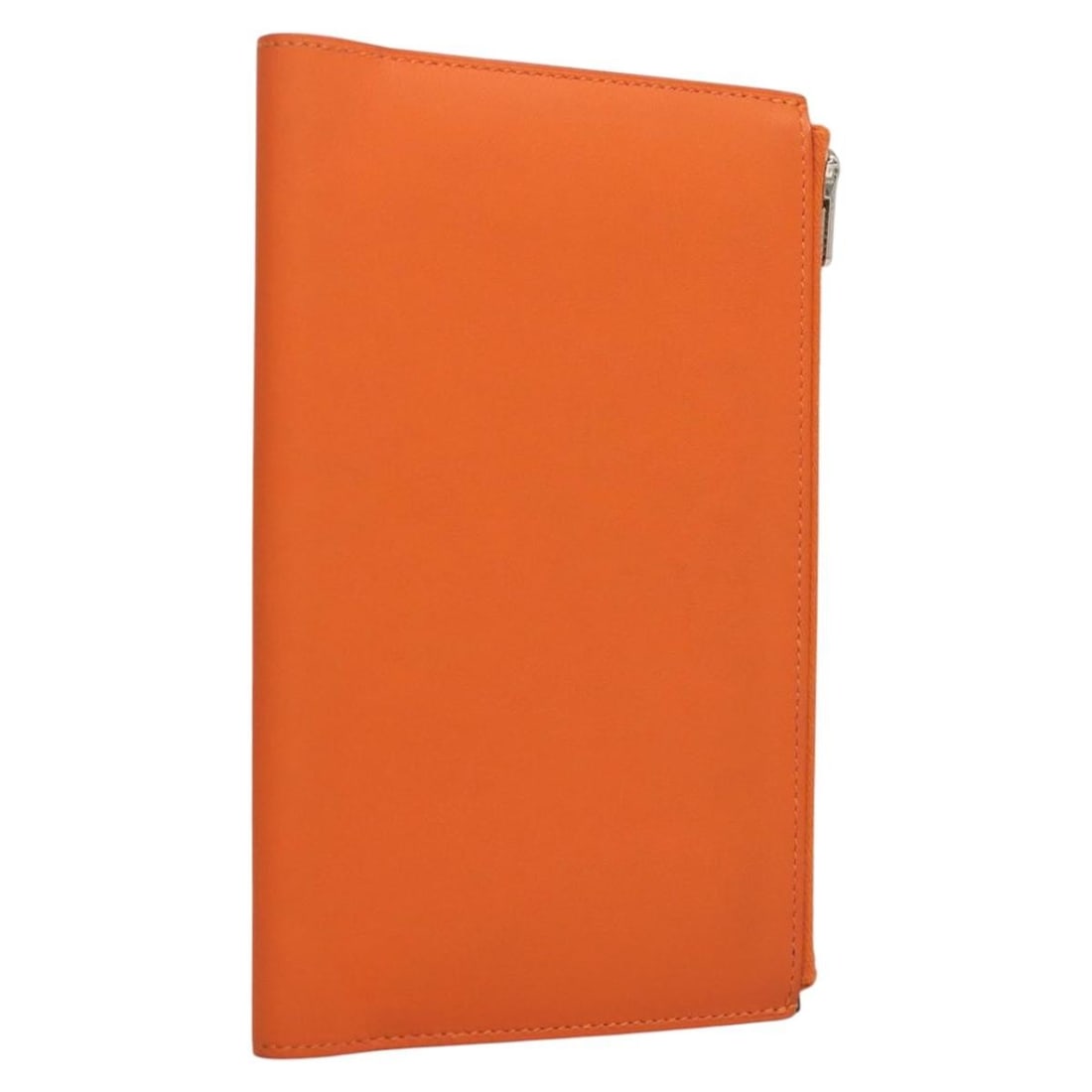 Hermes Orange Leather EA Zip PM Agenda Cover with Box: Hermes Orange Leather EA Zip PM Agenda Cover with Box This is an authentic Hermes EA Zip PM day planner cover crafted from orange Vaux Swift leather. Designed for women, this elegant cover features a 