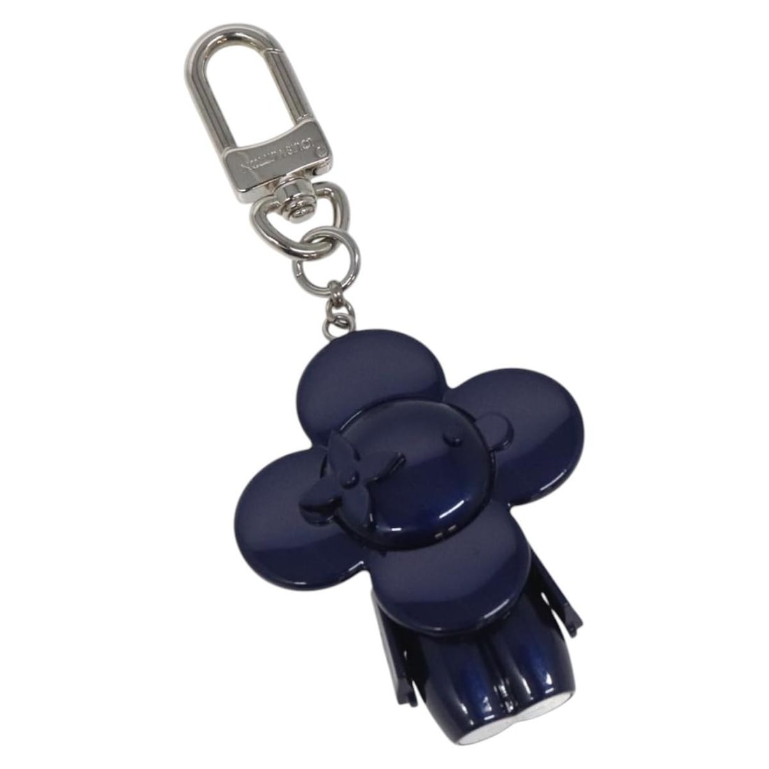 Navy Metal Vivienne Bag Charm by Louis Vuitton M00483: Navy Metal Vivienne Bag Charm by Louis Vuitton M00483 This Louis Vuitton Vivienne charm is crafted from navy-colored metal and is designed as a stylish accessory for women. The item is in very good co