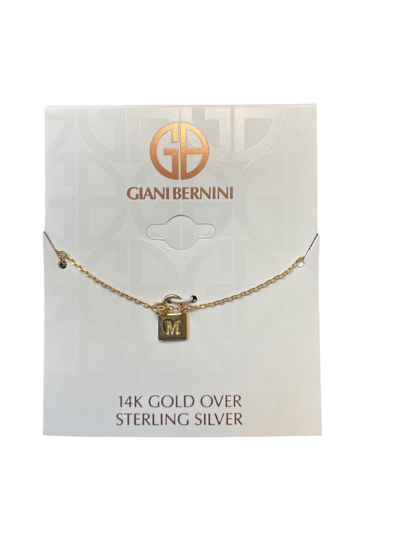 Giani Bernini Gold Initial Padlock Pendant Necklace Letter M 18k: Giani Bernini Gold Initial Padlock Pendant Necklace Letter M 18k Elevate your jewelry collection with this exquisite Giani Bernini Initial Padlock Pendant Necklace featuring the letter 'M'. This styli