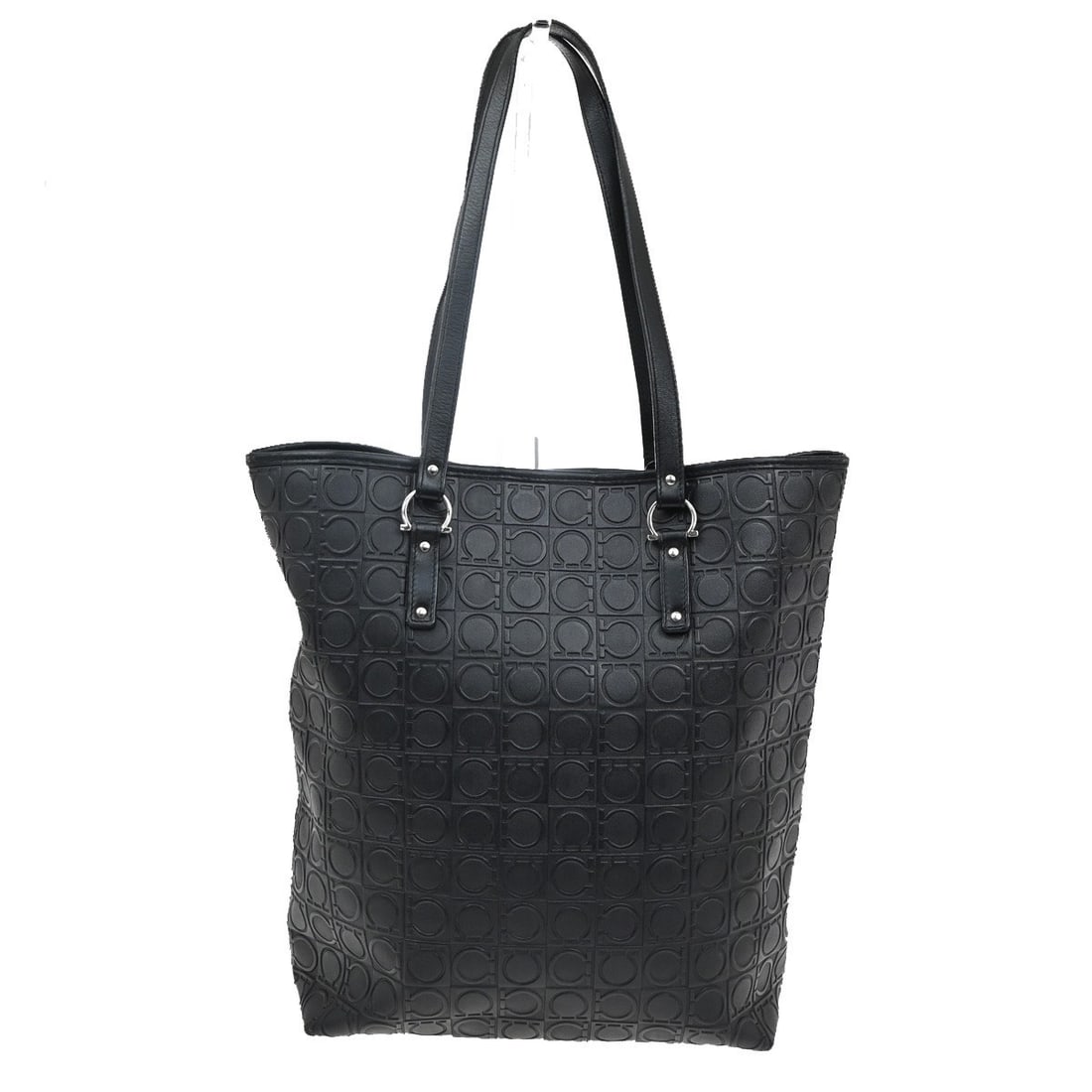 Gancini Tote Shoulder Bag by Salvatore Ferragamo in Black Canvas: Gancini Tote Shoulder Bag by Salvatore Ferragamo in Black Canvas This Salvatore Ferragamo Gancini tote is crafted from black canvas and designed for women. Made in Italy, the bag features the signatur
