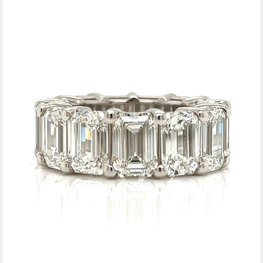 GIA Certified Platinum 16.19 Ct Emerald-cut Diamond Eternity Band: GIA Certified Platinum 16.19 Ct Emerald-cut Diamond Eternity Band This stunning Platinum Eternity Band features 13 GIA Certified Emerald-cut Diamonds, totaling an impressive 16.19 Ct. Each diamond is 