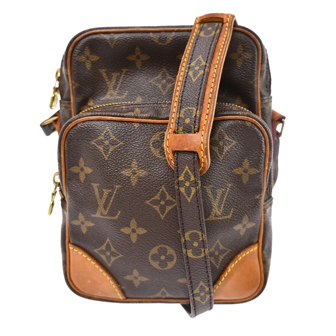 Louis Vuitton Amazone Monogram Crossbody Bag: Louis Vuitton Amazone Monogram Crossbody Bag This vintage Louis Vuitton Amazon crossbody bag features the iconic monogram canvas leather exterior in brown, complemented by a matching brown canvas leat