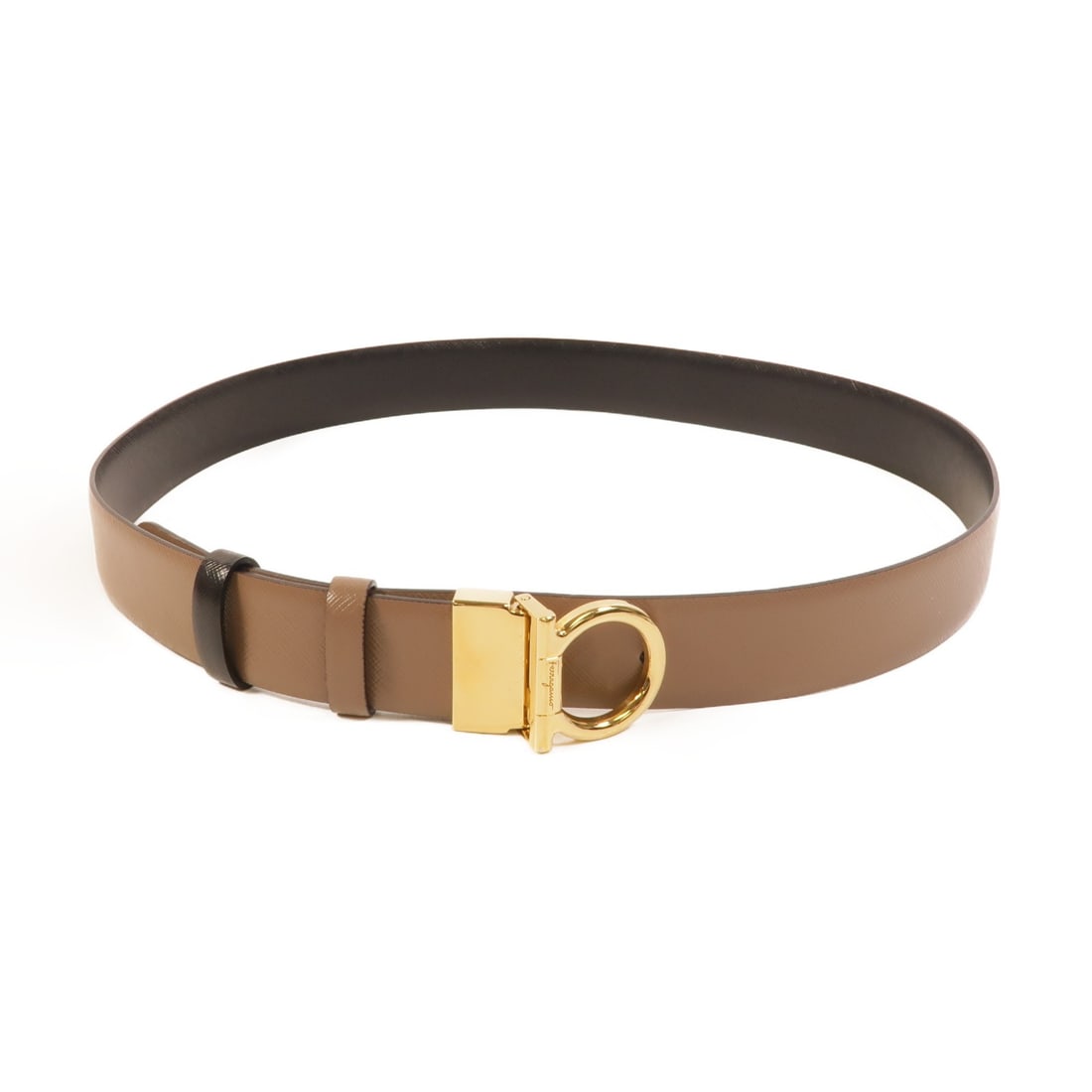 Salvatore Ferragamo reversible calfskin belt Gancini brown black: Salvatore Ferragamo reversible calfskin belt Gancini brown black This Salvatore Ferragamo Gancini reversible belt is crafted from high-quality calfskin leather and features a sophisticated brown color