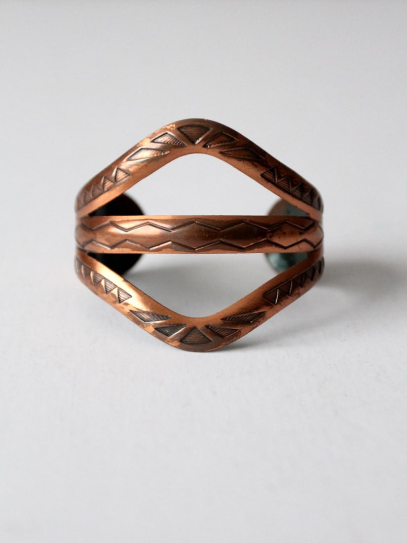 Vintage Solid Copper Wide Cuff Bracelet Mexican Design: Vintage Solid Copper Wide Cuff Bracelet Mexican Design This vintage solid copper cuff bracelet showcases a beautifully stamped southwest geometric and sun design, reflecting the rich cultural heritage