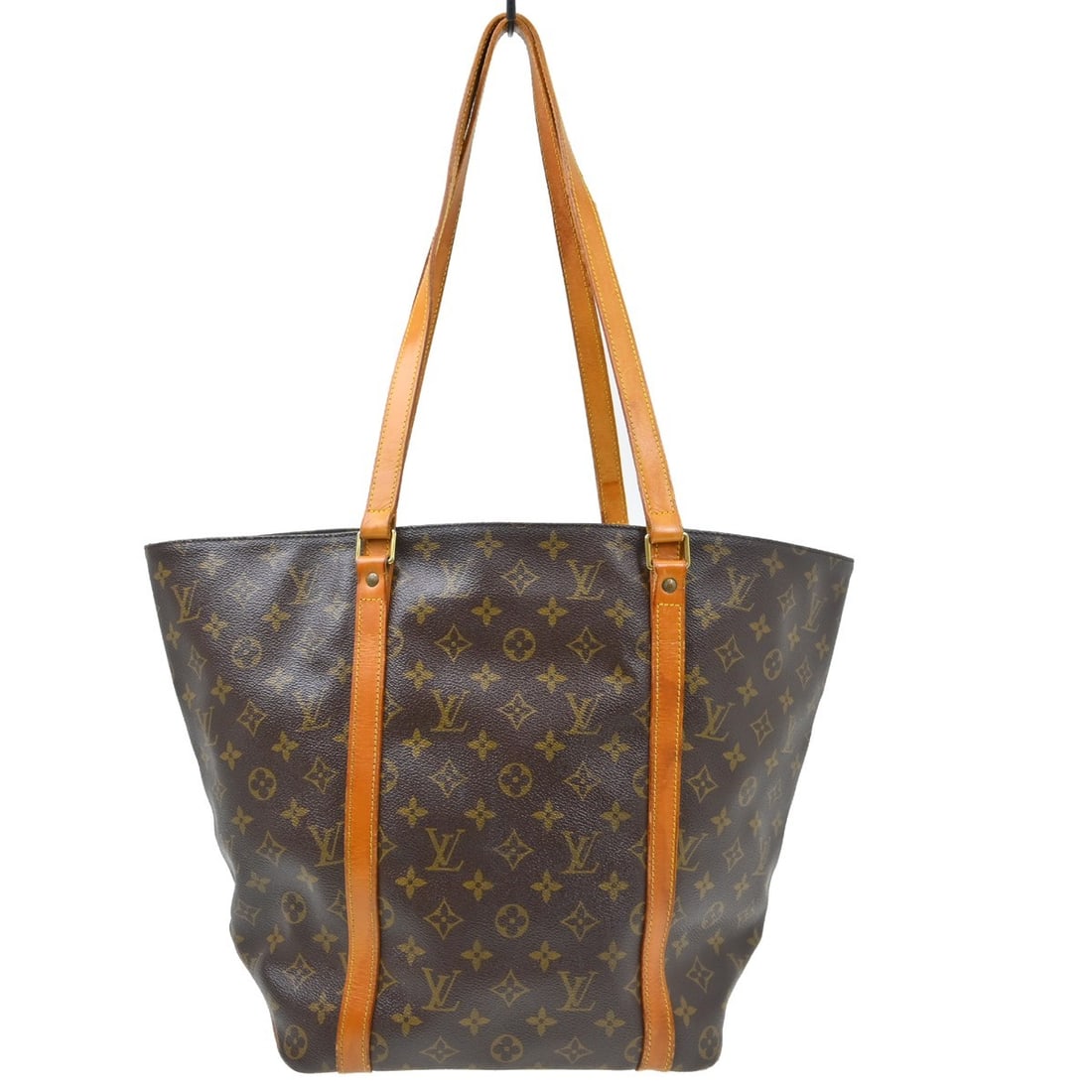 Louis Vuitton Monogram Canvas Sac Shopping Tote M51108: Louis Vuitton Monogram Canvas Sac Shopping Tote M51108 This Louis Vuitton Sac Shopping shoulder tote bag features the iconic Monogram canvas leather exterior with beige double handles. Designed in a l