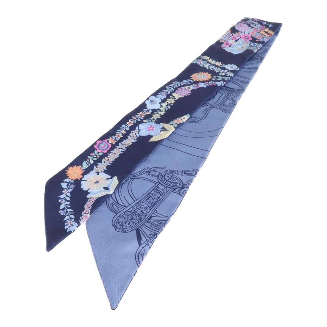 Hermes Blue Silk Twilly Scarf: Hermes Blue Silk Twilly Scarf This Hermes Twilly scarf is crafted from luxurious silk in a striking blue hue. Designed for women, it features a classic scarf style with a regular size type. Made in Fr