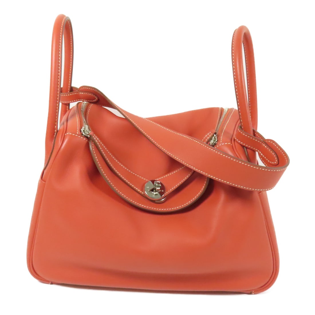 Hermes Lindy 30 Orange Calfskin 2 Way Shoulder Bag: Hermes Lindy 30 Orange Calfskin 2 Way Shoulder Bag This Hermes Lindy 30 is a versatile 2-way shoulder bag and handbag crafted from Swift leather in the Rose Jaipur (orange) color. Designed for women, 