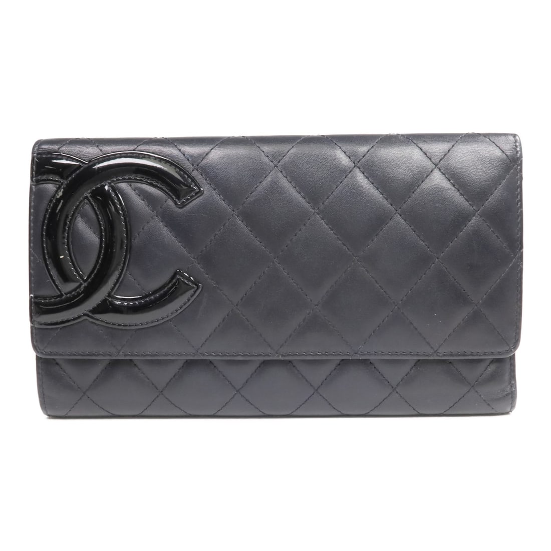 CHANEL Cambon tri fold long wallet black calfskin: CHANEL Cambon tri fold long wallet black calfskin This CHANEL Cambon tri-fold long wallet is crafted from black calfskin leather with a pink interior accent. Designed for women, it features the iconic