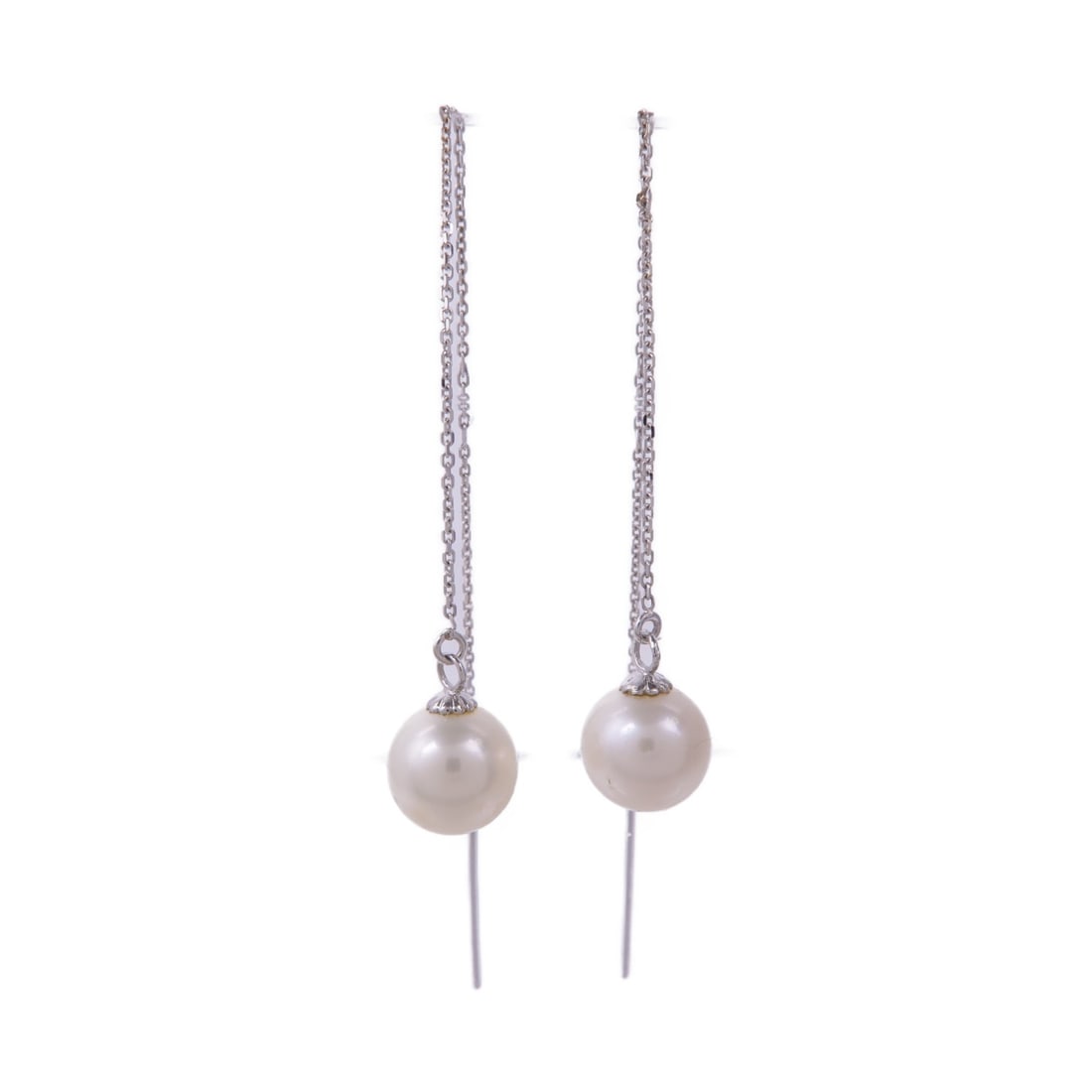 Pearl Earrings in 18K White Gold by JEWELRY: Pearl Earrings in 18K White Gold by JEWELRY These stunning pearl earrings are crafted from high-quality 18K white gold, offering a luxurious and elegant touch to any outfit. Designed as pierced earrin
