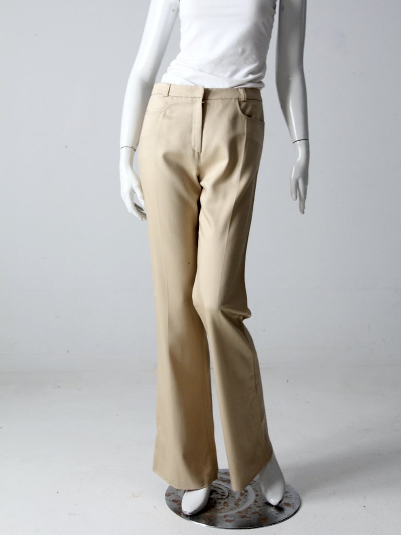 Vintage gVB C'Est Comme Ca Tan Wool Blend Bootcut Trousers: Vintage gVB C'Est Comme Ca Tan Wool Blend Bootcut Trousers Elevate your style with these vintage gVB C'est Comme Ca trousers, crafted from a luxurious tan wool blend. Featuring a draped bootcut leg, t