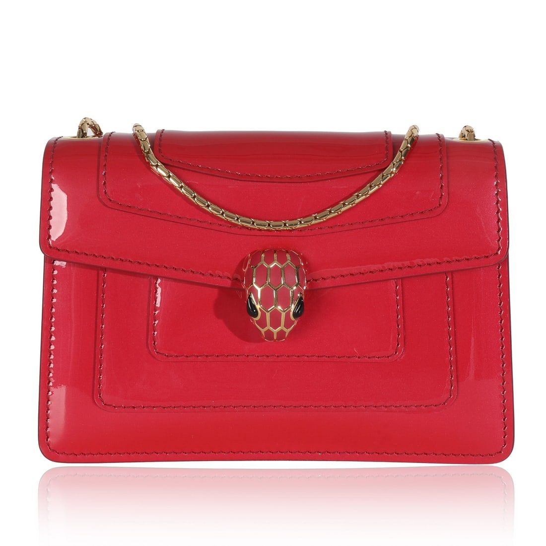 Mini Serpenti Forever Patent Leather Pink Crossbody Shoulder Bag by Bvlgari: Mini Serpenti Forever Patent Leather Pink Crossbody Shoulder Bag by Bvlgari This Bvlgari Mini Serpenti Forever crossbody bag is crafted from dark pink patent leather and features a compact mini size. 