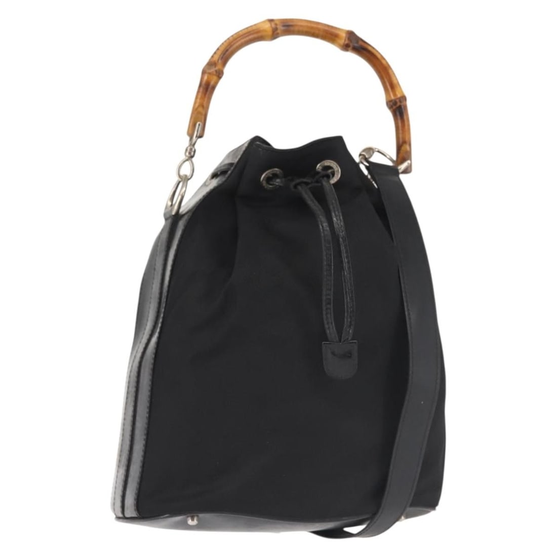 Vintage Gucci Black Nylon and Leather Bucket Handbag with Bamboo Handle: Vintage Gucci Black Nylon and Leather Bucket Handbag with Bamboo Handle This vintage Gucci Bamboo Bucket Bag features a black nylon body with leather accents. Designed for women, it offers a classic b