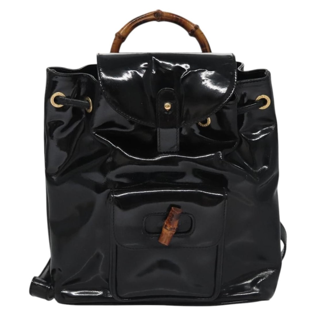 Black Patent Leather Gucci Bamboo Vintage Backpack for Women: Black Patent Leather Gucci Bamboo Vintage Backpack for Women This Gucci Vintage Bamboo Backpack is crafted from black patent leather and features a signature bamboo handle. Designed for women, the bac