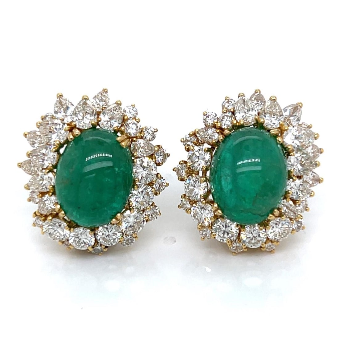 Emerald and Diamond Earrings in 18K Yellow Gold 18.00 Carat Gemstones: Emerald and Diamond Earrings in 18K Yellow Gold 18.00 Carat Gemstones These pre-owned earrings are crafted in 18K yellow gold and feature two emeralds with a total approximate weight of 18.00 carats. 