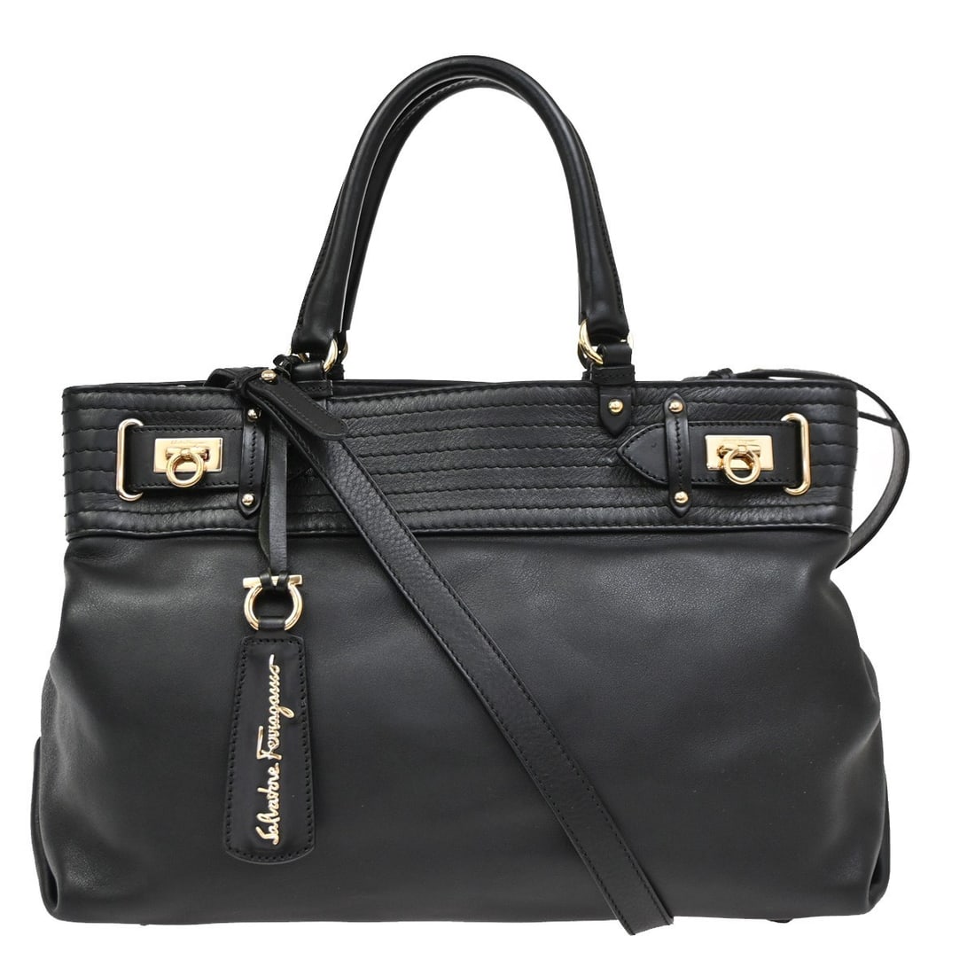 Black Leather Gancini Tote Bag by Salvatore Ferragamo: Black Leather Gancini Tote Bag by Salvatore Ferragamo This Salvatore Ferragamo Gancini Tote is crafted from black leather and designed for women. The bag is pre-owned and remains in very good conditio