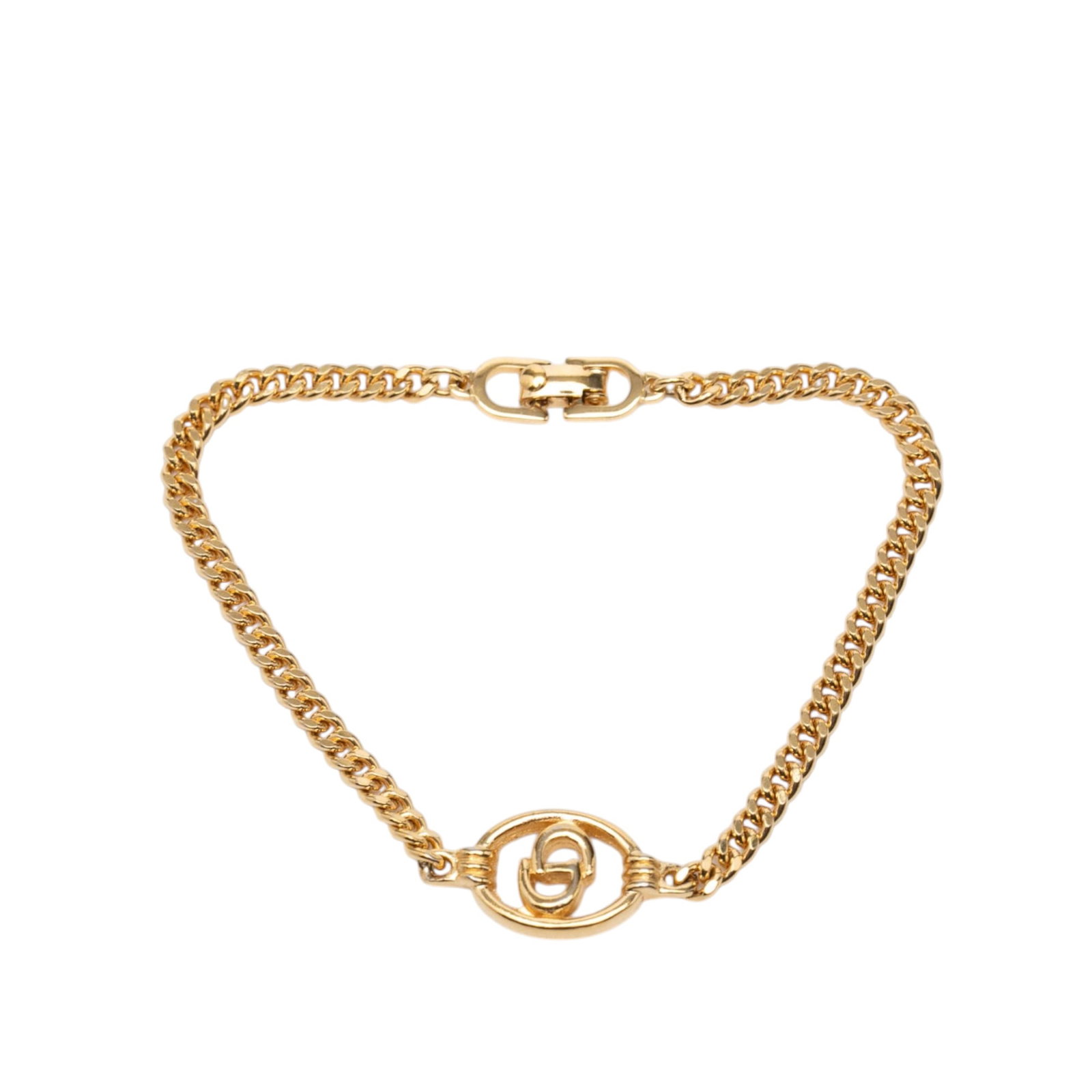Dior CD Logo Gold Tone Bracelet: Dior CD Logo Gold Tone Bracelet This Dior bracelet features a gold-tone metal body with the iconic CD logo and is secured with a fold over clasp. Originating from Germany, it is categorized as costume