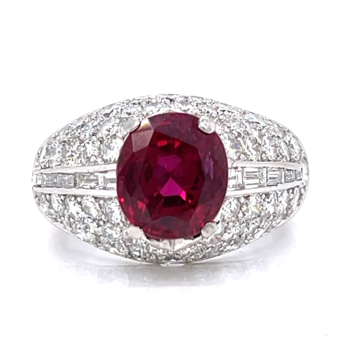 18K White Gold 3.67 Ct AGL Certified Ruby Ring with 70 Diamonds: 18K White Gold 3.67 Ct AGL Certified Ruby Ring with 70 Diamonds This exquisite 18K White Gold ring features a stunning 3.67 Ct. AGL Certified Ruby at its center, surrounded by a total of 70 diamonds. 