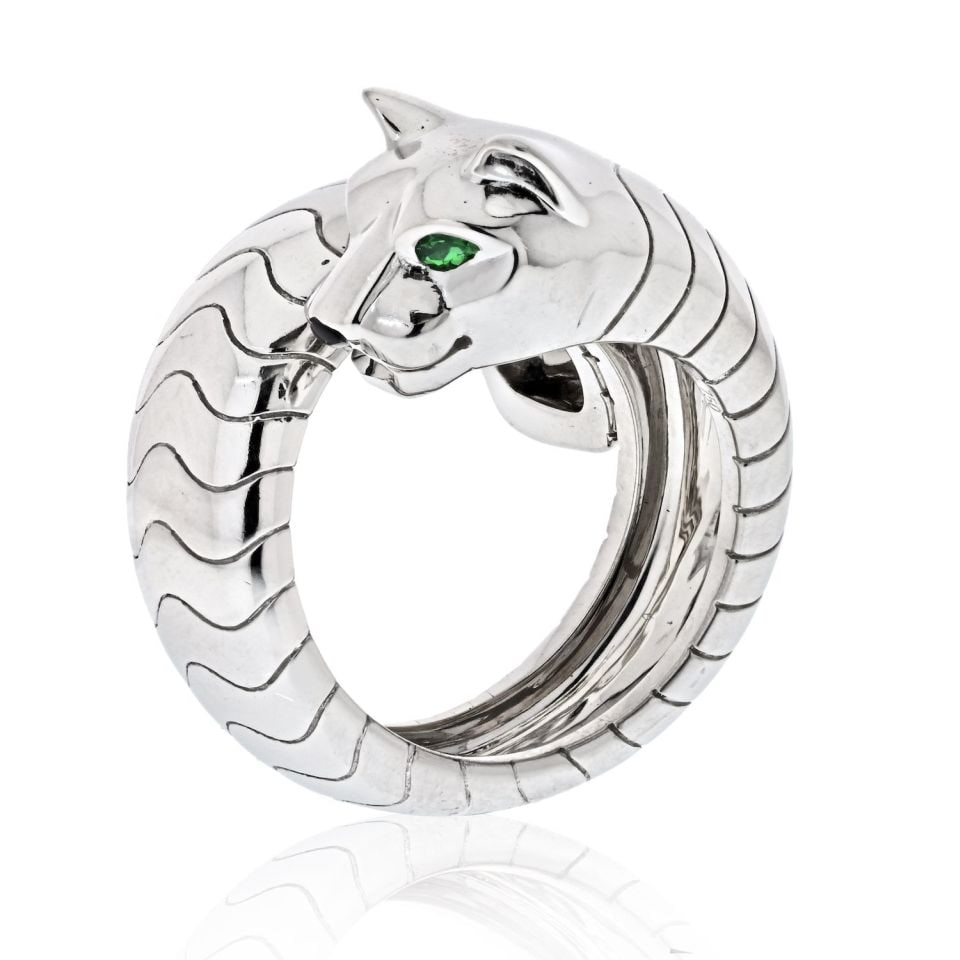 Lakarda Panthere de Cartier Emerald Onyx Wrap 18K White Gold Ring: Lakarda Panthere de Cartier Emerald Onyx Wrap 18K White Gold Ring This Cartier Lakarda Wrap Panthere ring from the Panthere de Cartier collection is crafted in 18K white gold. The wrap-around design f