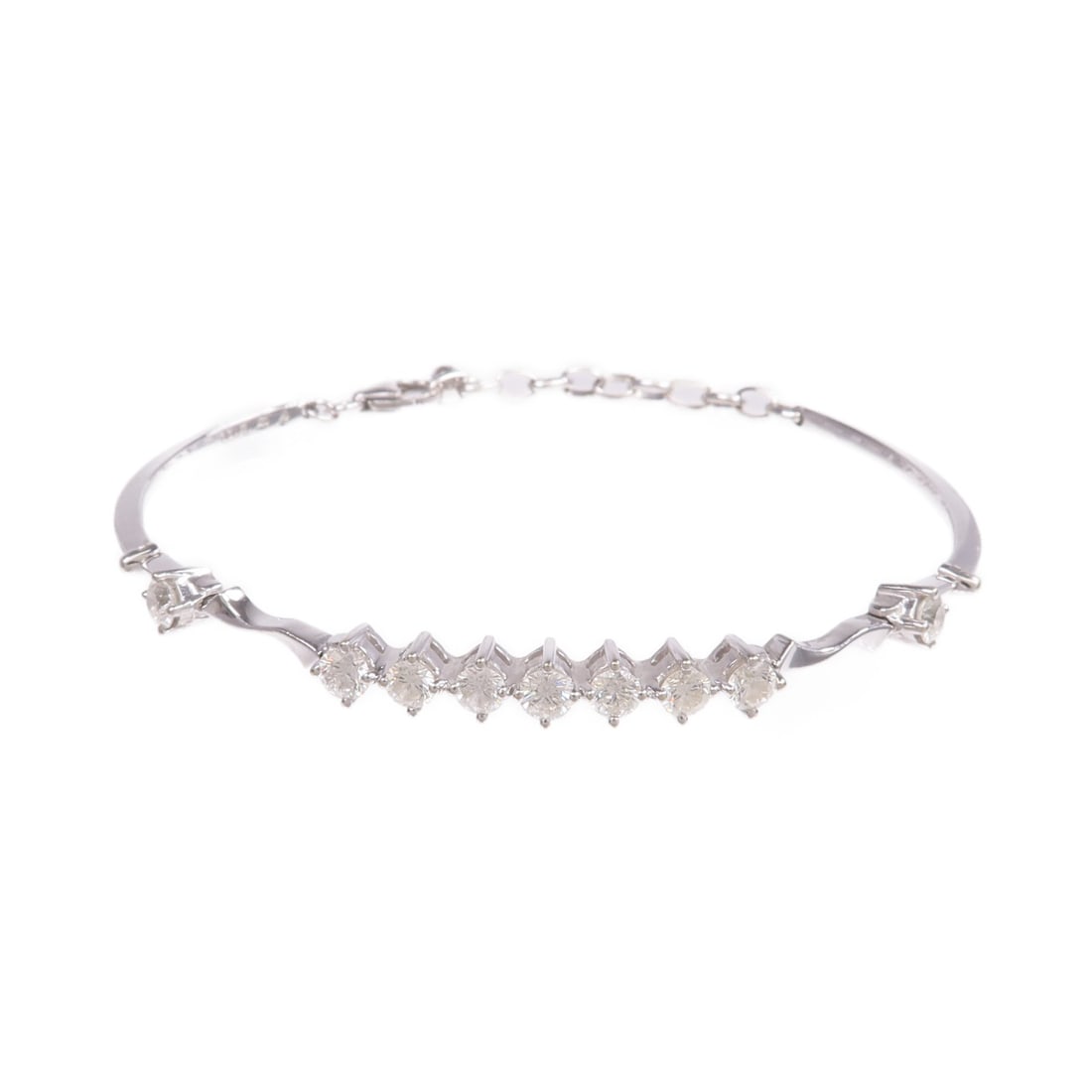 Diamond Bracelet in 18K White Gold from JEWELRY: Diamond Bracelet in 18K White Gold from JEWELRY This elegant bracelet features sparkling diamonds set in 18K white gold. Designed with a regular size type, it showcases a clear frame and classic styli
