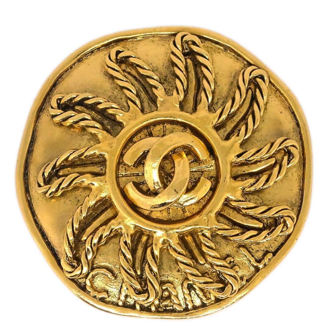 Chanel Gold-Plated Medallion Brooch Pin 94A: Chanel Gold-Plated Medallion Brooch Pin 94A This stunning Chanel Medallion Sun Brooch Pin is a timeless accessory that showcases a beautiful gold-plated finish, embodying elegance and style. The brooc