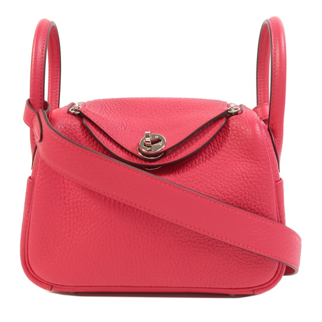 Hermes Mini Lindy Shoulder Bag in Pink Taurillon Clemence Leather with PHW: Hermes Mini Lindy Shoulder Bag in Pink Taurillon Clemence Leather with PHW This Hermes Mini Lindy 2-way shoulder bag is crafted from Taurillon Clemence calfskin leather in a striking Rose Extreme pink