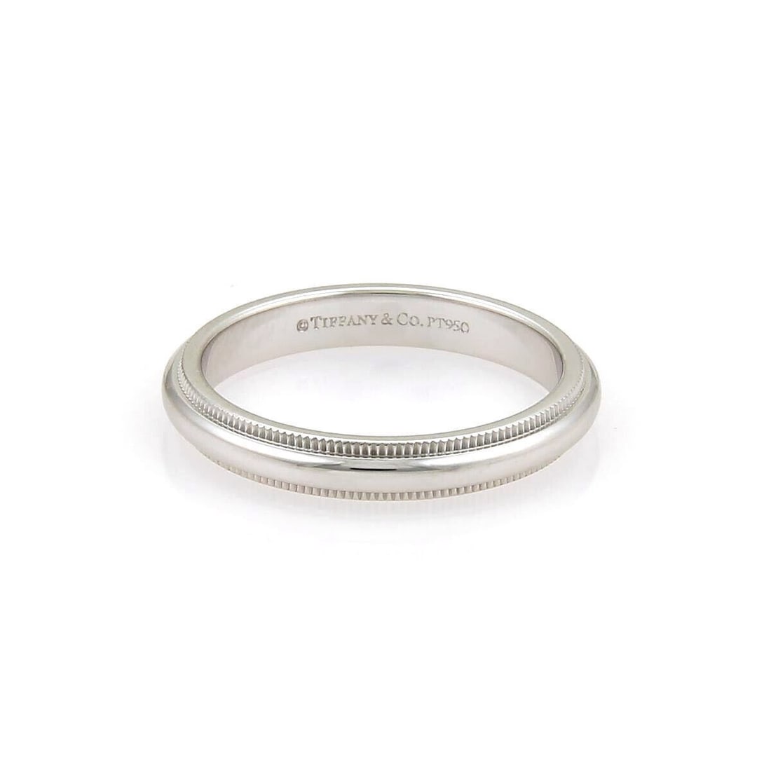Tiffany & Co Platinum Double Milgrain Band Ring Size 7.5: Tiffany & Co Platinum Double Milgrain Band Ring Size 7.5 This Tiffany & Co. wedding band ring is expertly crafted in solid platinum (Pt950) and features a classic double milgrain design along the edge