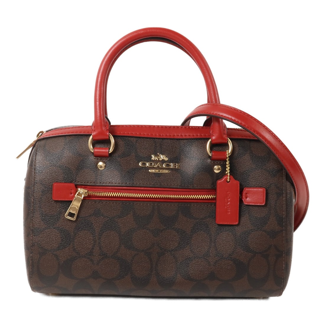 COACH 83607 Brown Red Coated Canvas 2 Way Shoulder Bag: COACH 83607 Brown Red Coated Canvas 2 Way Shoulder Bag This COACH 2-way shoulder bag features a stylish brown and red design crafted from durable PVC coated canvas. Designed for versatility, it can be
