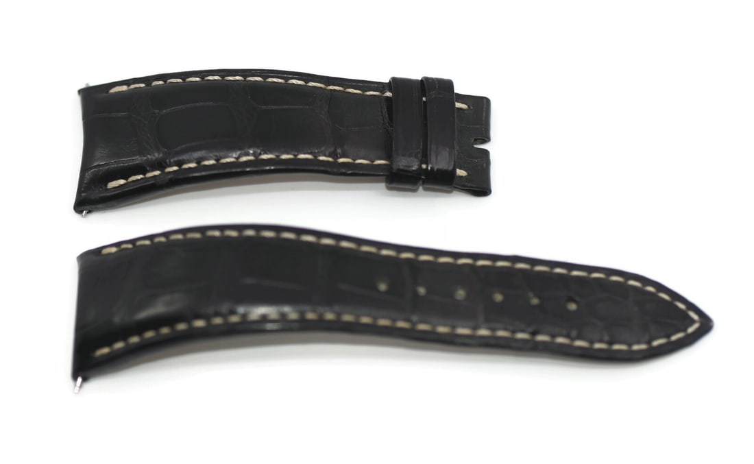 Audemars Piguet 23mm Black Leather Two-Piece Watch Strap Authentic: Audemars Piguet 23mm Black Leather Two-Piece Watch Strap Authentic Enhance your timepiece with this premium Audemars Piguet Black Leather Strap, designed for both style and comfort. This two-piece wri