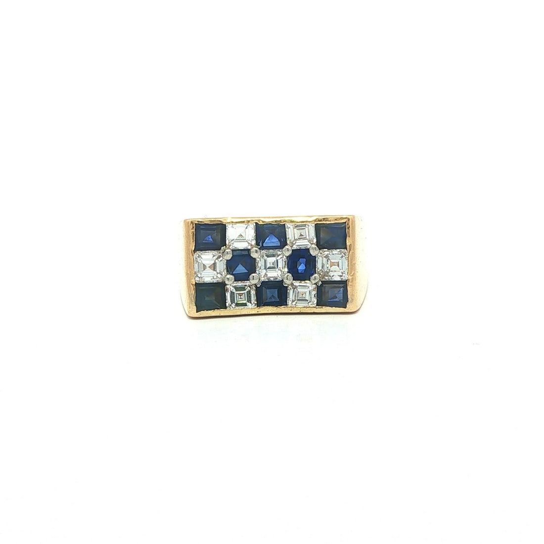 Oscar Heyman sapphire diamond cocktail ring 18k yellow gold platinum: Oscar Heyman sapphire diamond cocktail ring 18k yellow gold platinum This vintage Oscar Heyman cocktail ring features a checkerboard design set with eight natural square step-cut sapphires in a rich b