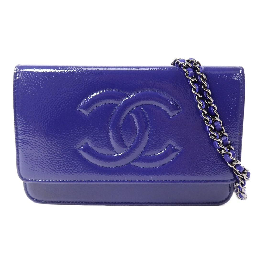 CHANEL Purple Patent Leather WOC Shoulder Bag: CHANEL Purple Patent Leather WOC Shoulder Bag This CHANEL Wallet On Chain (WOC) shoulder bag features a striking purple patent leather exterior and iconic CC details with silver-tone hardware. Designe