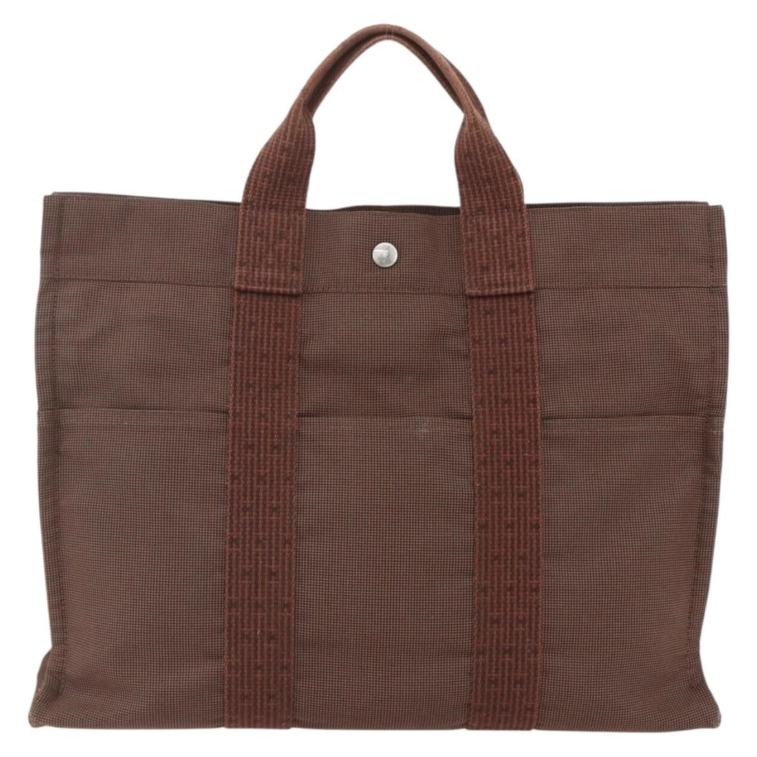 Hermes Herline MM Brown Canvas Tote Bag 43x30x10cm: Hermes Herline MM Brown Canvas Tote Bag 43x30x10cm This pre-owned Hermes Fourre-tout Herline MM handbag for women features a brown canvas exterior. It shows signs of use including surface rubbing, sli